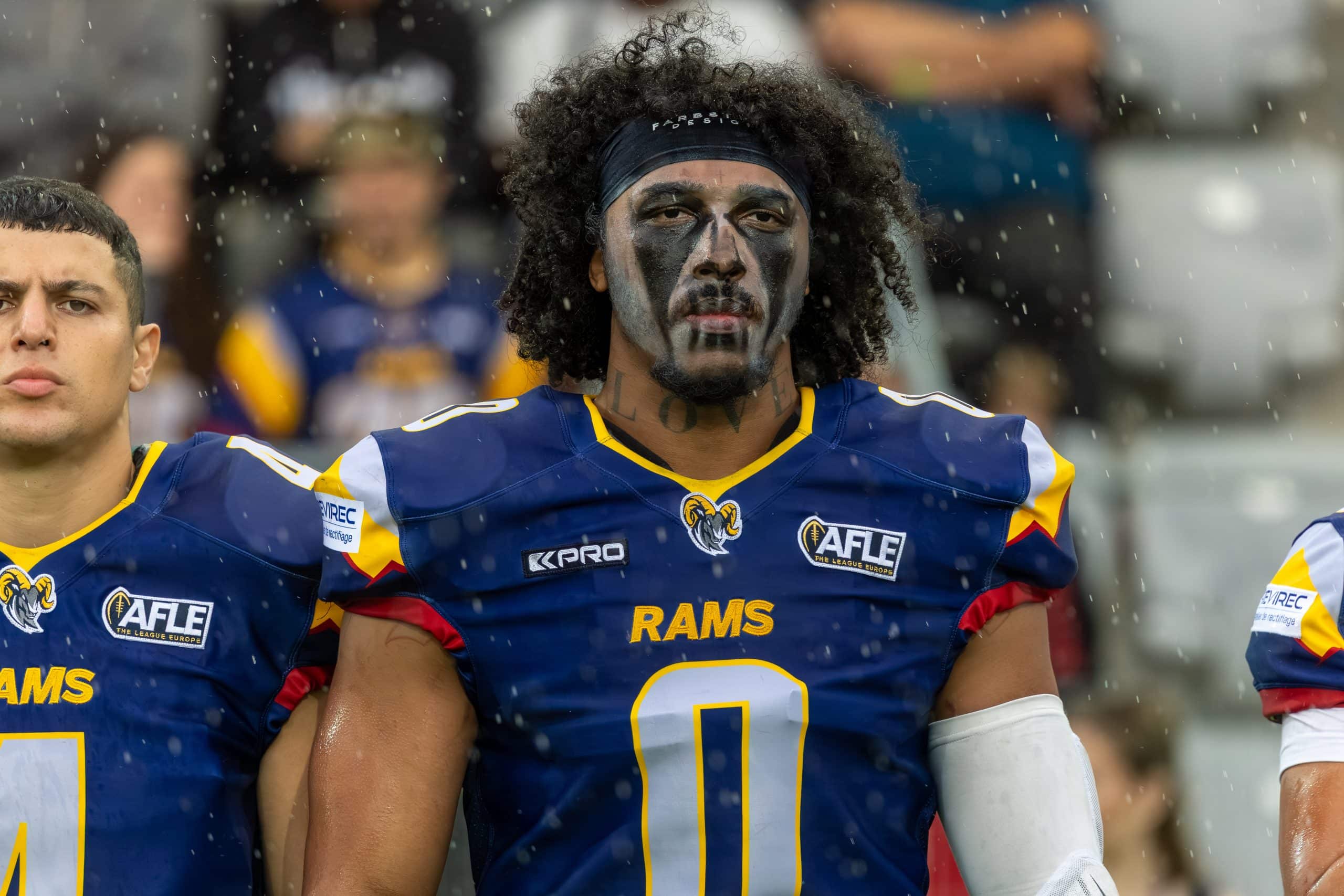 Alpine Rams player in war paint ahead of the Paris Lights home game