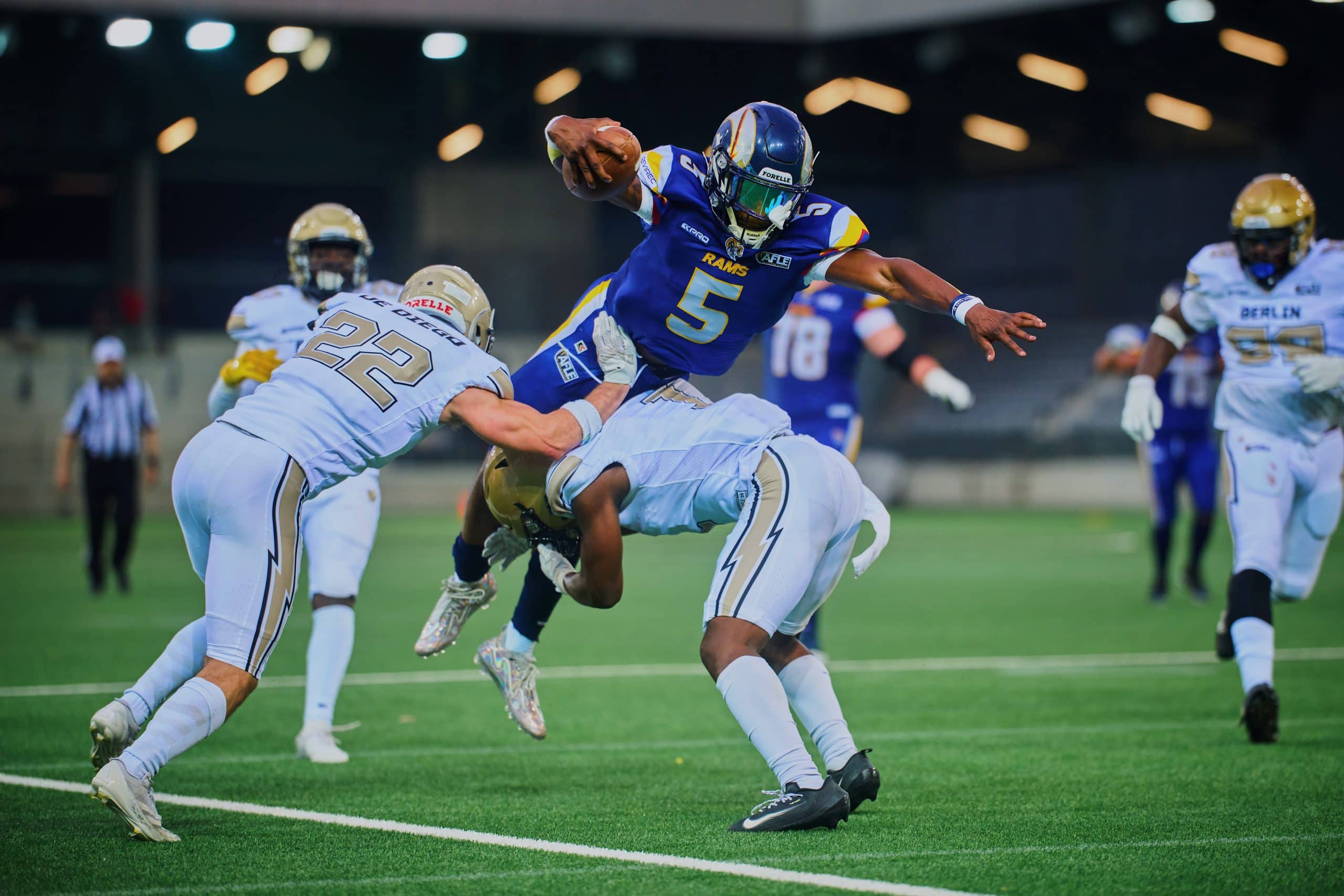 Alpine Rams quarterback Gabriel Cunningham leaping into the endzone at Tissot Arena